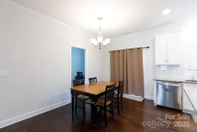 679 Cape Fear St, Fort Mill, SC 29715 - dining room featuring a chandelier, crown molding, and dark wood-style flooring