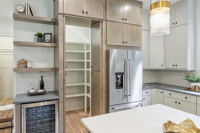 1834 Arnold Dr, Charlotte, NC 28205 - kitchen featuring high end fridge, beverage cooler, open shelves, light wood-style flooring, and decorative light fixtures