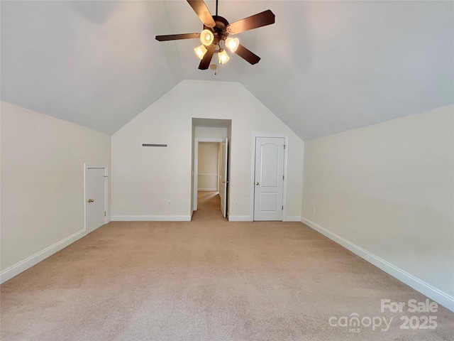 12904 Windy Lea Ln, Huntersville, NC 28078 - additional living space with a ceiling fan, light carpet, lofted ceiling, and baseboards