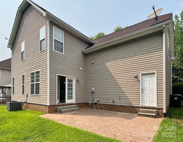 12904 Windy Lea Ln, Huntersville, NC 28078 - rear view of property with entry steps, a lawn, and a patio area
