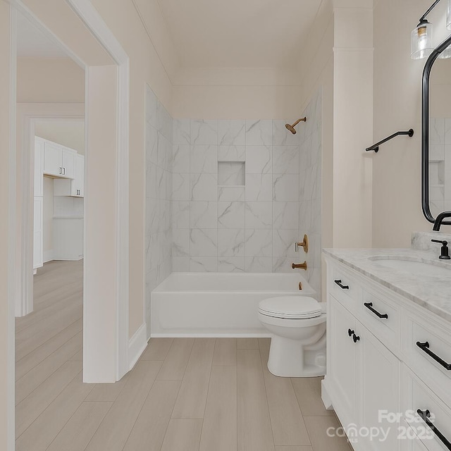 1003 S Ridge Ave, Kannapolis, NC 28083 - bathroom with vanity, washtub / shower combination, toilet, and baseboards