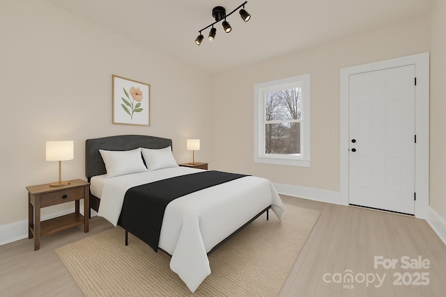 1003 S Ridge Ave, Kannapolis, NC 28083 - bedroom with light wood finished floors and baseboards