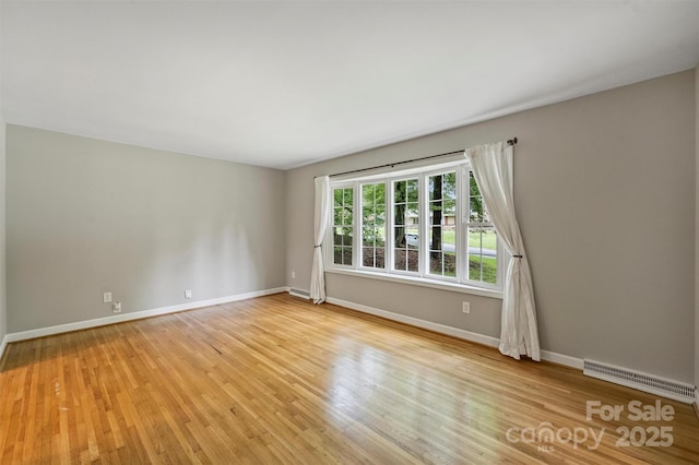 2301 Seth Thomas Rd, Charlotte, NC 28210 - unfurnished room featuring light wood-style floors and baseboards