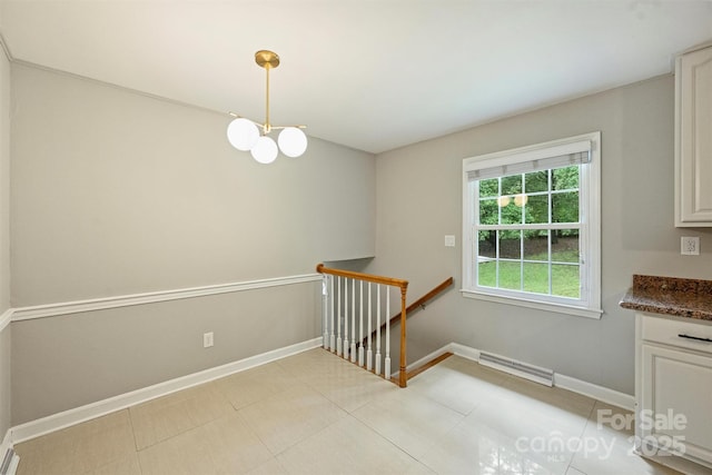 2301 Seth Thomas Rd, Charlotte, NC 28210 - unfurnished dining area with baseboards and a chandelier