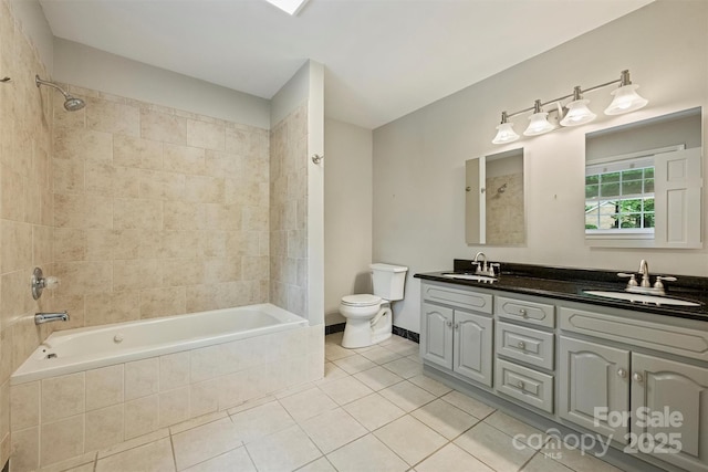 2301 Seth Thomas Rd, Charlotte, NC 28210 - bathroom with double vanity, tile patterned floors, toilet, and tiled shower / bath combo