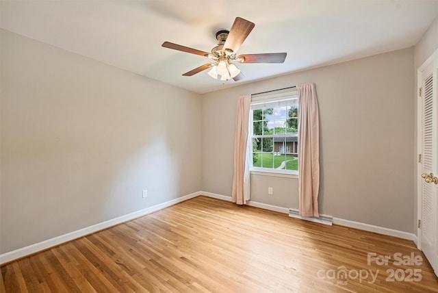2301 Seth Thomas Rd, Charlotte, NC 28210 - unfurnished room featuring baseboards, light wood-style flooring, and ceiling fan