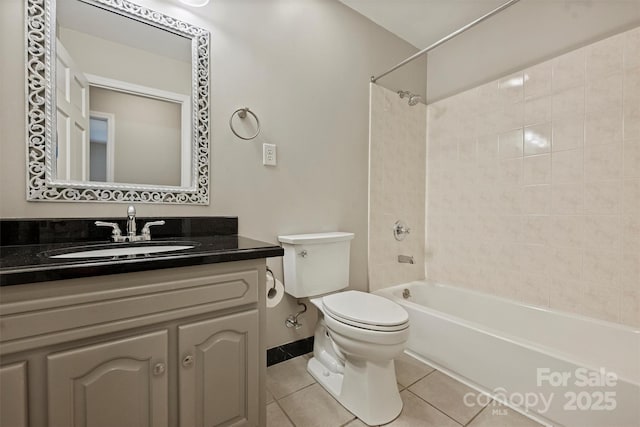 2301 Seth Thomas Rd, Charlotte, NC 28210 - full bathroom featuring toilet, tile patterned flooring, bathtub / shower combination, vanity, and baseboards