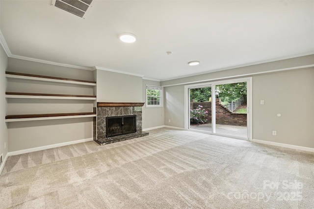 2301 Seth Thomas Rd, Charlotte, NC 28210 - unfurnished living room with ornamental molding, a stone fireplace, carpet flooring, and baseboards