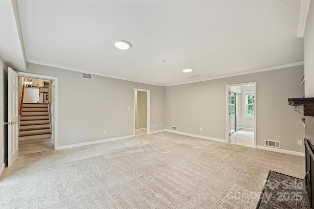 2301 Seth Thomas Rd, Charlotte, NC 28210 - unfurnished living room with ornamental molding, stairs, light carpet, and baseboards