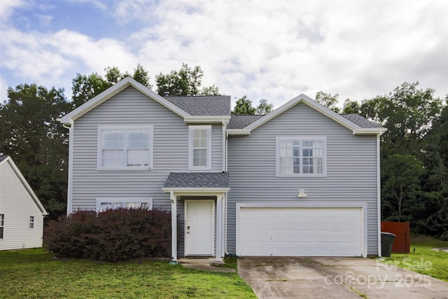 585 Gentle Breeze Ln, Rock Hill, SC 29730 - traditional-style house with a garage, driveway, and a shingled roof