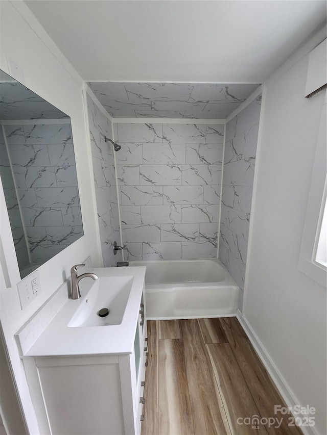 1434 N Hamilton St, High Point, NC 27262 - full bath featuring vanity, wood finished floors, and bathtub / shower combination