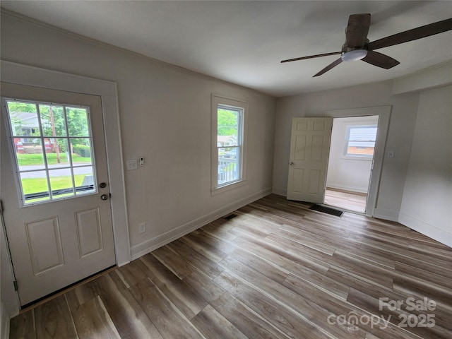 1434 N Hamilton St, High Point, NC 27262 - entryway with wood finished floors, ceiling fan, and baseboards