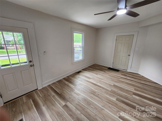 1434 N Hamilton St, High Point, NC 27262 - entryway featuring a ceiling fan, light wood finished floors, and baseboards