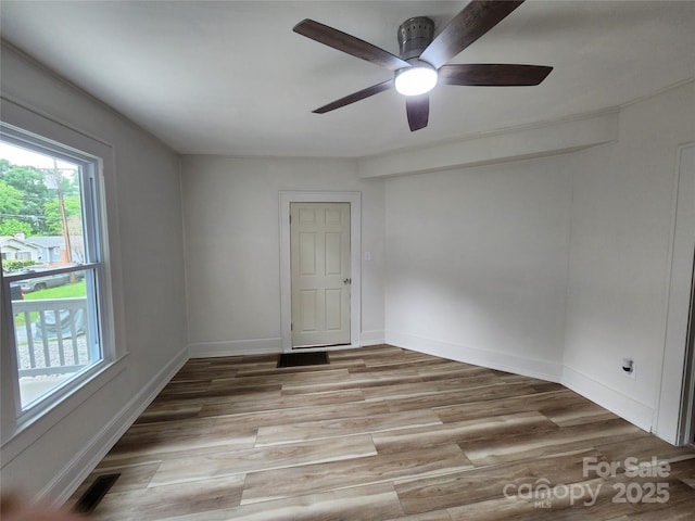 1434 N Hamilton St, High Point, NC 27262 - unfurnished room featuring light wood-style floors, ceiling fan, and baseboards