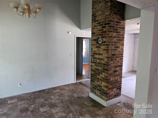 211 Putnam St, Shelby, NC 28152 - unfurnished room with a chandelier and baseboards