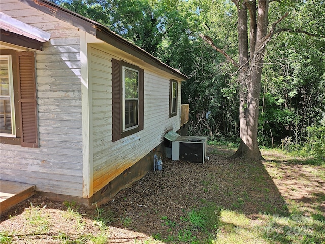 211 Putnam St, Shelby, NC 28152 - view of property exterior featuring a central air condition unit