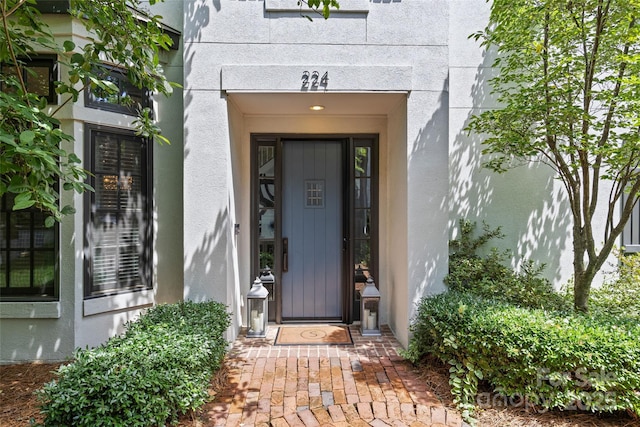 224 Wendover Heights Cir, Charlotte, NC 28211 - view of exterior entry featuring stucco siding