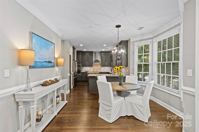 224 Wendover Heights Cir, Charlotte, NC 28211 - dining room with ornamental molding, a chandelier, dark wood-type flooring, recessed lighting, and baseboards