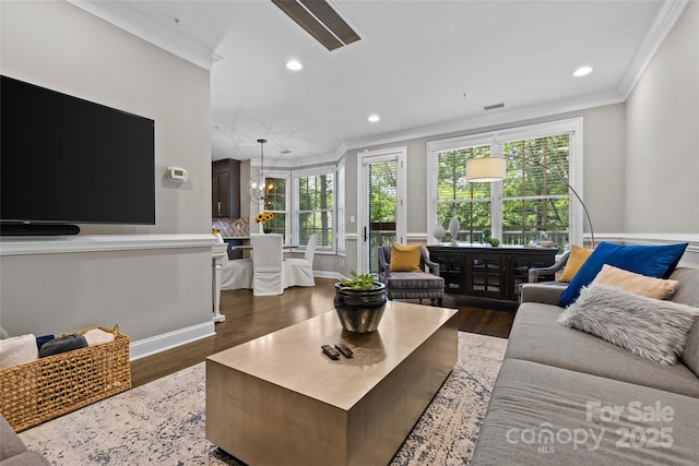 224 Wendover Heights Cir, Charlotte, NC 28211 - living area with crown molding, dark wood-style flooring, recessed lighting, and baseboards