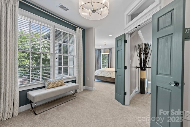 224 Wendover Heights Cir, Charlotte, NC 28211 - hallway featuring a chandelier, light carpet, and baseboards