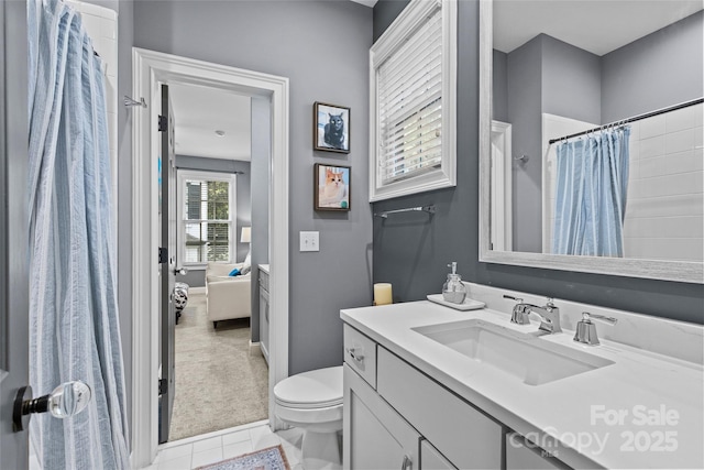 224 Wendover Heights Cir, Charlotte, NC 28211 - bathroom with vanity, toilet, tile patterned flooring, baseboards, and curtained shower