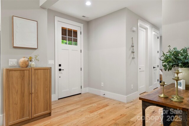 68 Huckleberry Ridge Ln, Zirconia, NC 28790 - foyer with light wood finished floors, baseboards, and recessed lighting