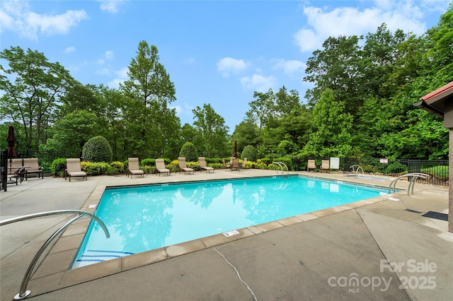68 Huckleberry Ridge Ln, Zirconia, NC 28790 - community pool with a patio and view of wooded area