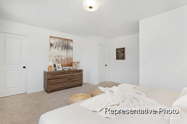 11335 Magpie Ct Unit 8, Charlotte, NC 28215 - carpeted bedroom with baseboards