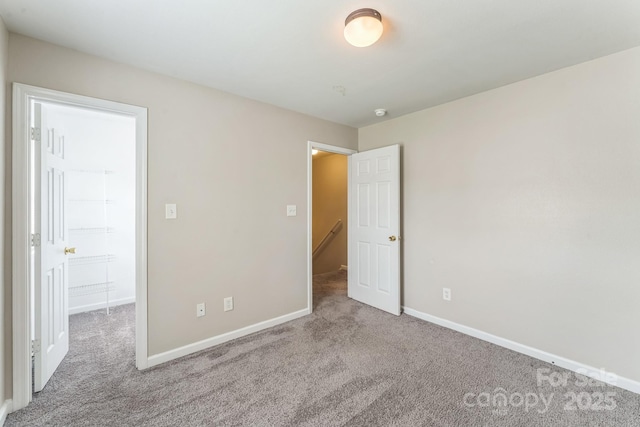 13413 Golden Apple Ct, Charlotte, NC 28215 - unfurnished bedroom featuring carpet floors and baseboards
