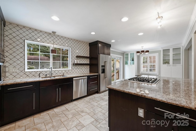 7050 Knightswood Dr, Charlotte, NC 28226 - kitchen featuring appliances with stainless steel finishes, backsplash, light stone finish floors, plenty of natural light, and recessed lighting