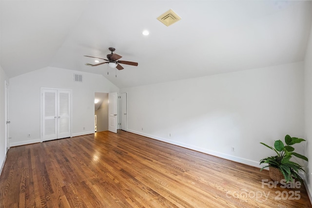 7050 Knightswood Dr, Charlotte, NC 28226 - additional living space with ceiling fan, vaulted ceiling, and wood finished floors