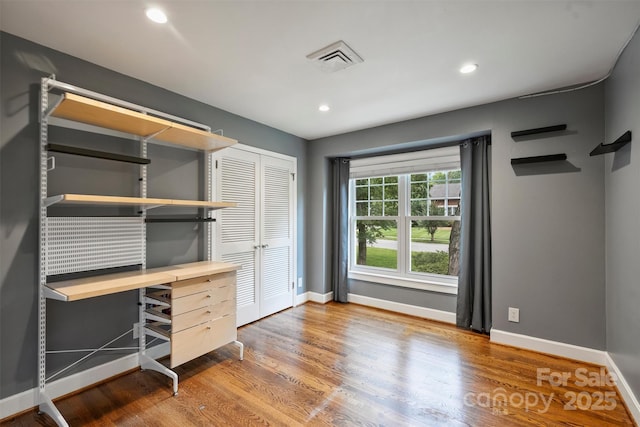7050 Knightswood Dr, Charlotte, NC 28226 - unfurnished office with wood finished floors and recessed lighting