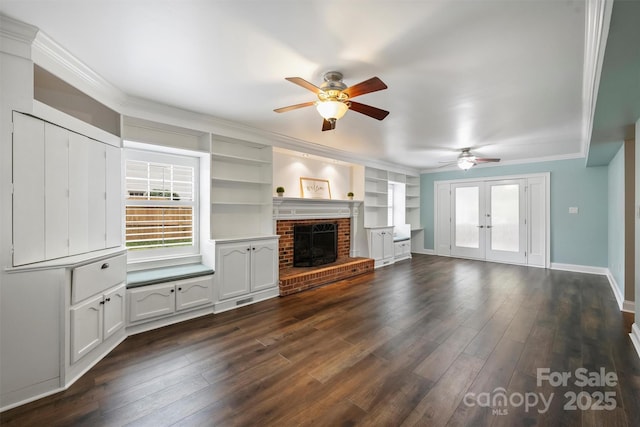 7050 Knightswood Dr, Charlotte, NC 28226 - unfurnished living room featuring ceiling fan, french doors, dark wood-style flooring, plenty of natural light, and crown molding