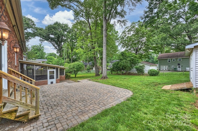 7050 Knightswood Dr, Charlotte, NC 28226 - view of yard featuring a sunroom and a patio