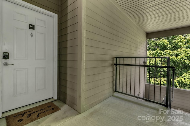 176 Brickton Village Cir Unit 302, Fletcher, NC 28732 - view of exterior entry featuring covered porch