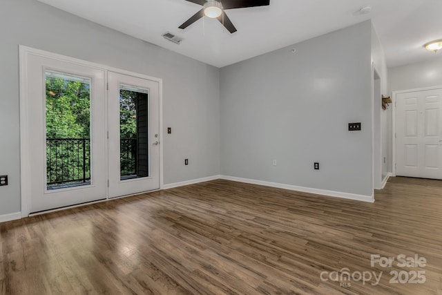 176 Brickton Village Cir Unit 302, Fletcher, NC 28732 - spare room with a ceiling fan, wood finished floors, and baseboards