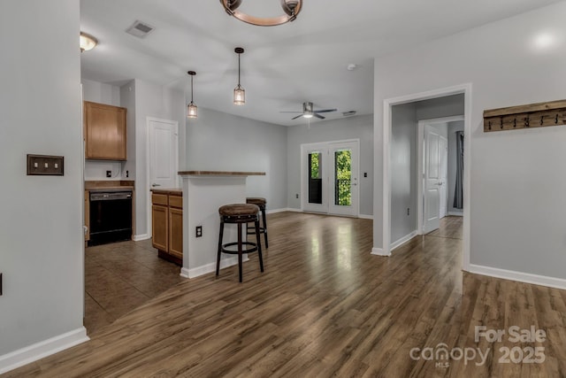 176 Brickton Village Cir Unit 302, Fletcher, NC 28732 - kitchen featuring dishwasher, open floor plan, dark wood-style flooring, and a ceiling fan