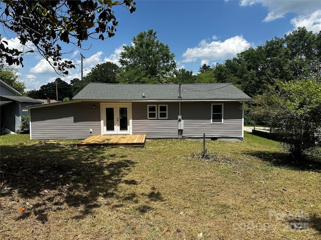 801 Calhoun St, Lancaster, SC 29720 - back of property with french doors, a yard, a deck, and roof with shingles