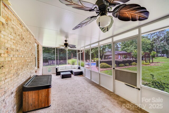 211 Drive Inn Rd, Locust, NC 28097 - sunroom / solarium featuring ceiling fan and outdoor lounge area
