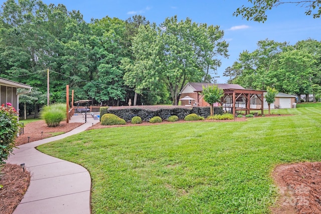 211 Drive Inn Rd, Locust, NC 28097 - view of green lawn featuring a garage