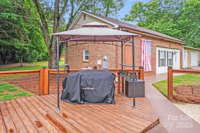 211 Drive Inn Rd, Locust, NC 28097 - deck with a gazebo and a grill