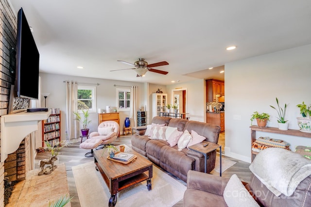 211 Drive Inn Rd, Locust, NC 28097 - living area featuring a fireplace, recessed lighting, light wood-type flooring, and ceiling fan
