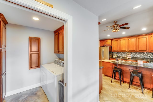 211 Drive Inn Rd, Locust, NC 28097 - washroom featuring independent washer and dryer, recessed lighting, baseboards, a ceiling fan, and cabinet space