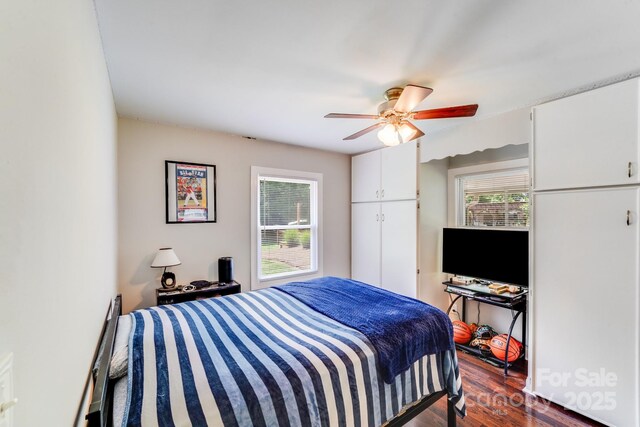 211 Drive Inn Rd, Locust, NC 28097 - bedroom with dark wood-style flooring and ceiling fan