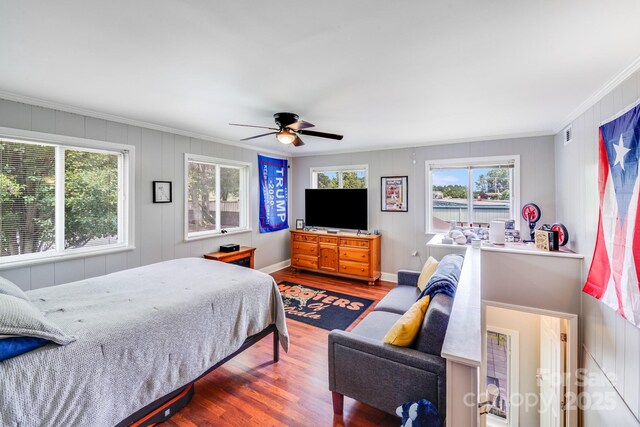 211 Drive Inn Rd, Locust, NC 28097 - bedroom with crown molding, wood finished floors, baseboards, and a ceiling fan