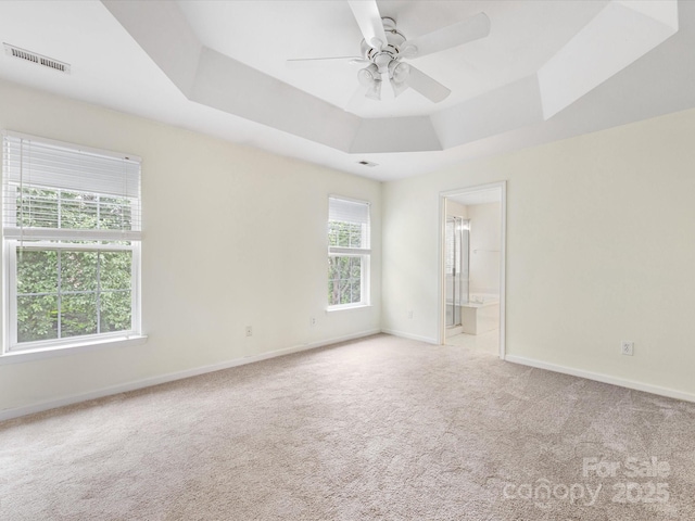 12529 Old Timber Rd, Charlotte, NC 28269 - carpeted empty room featuring a raised ceiling, a ceiling fan, and baseboards