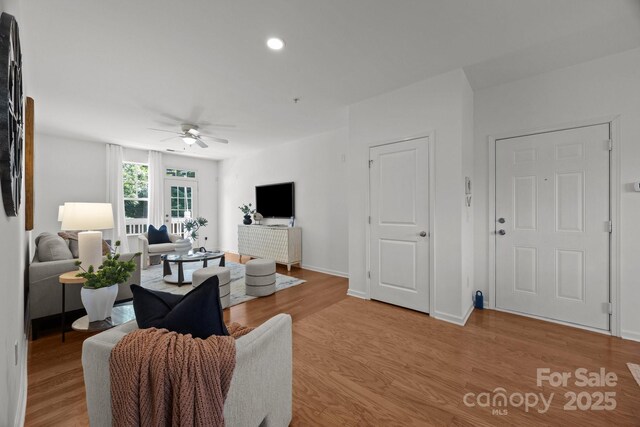 1556 Walnut View Dr, Charlotte, NC 28208 - living room featuring a ceiling fan, light wood-style floors, and recessed lighting