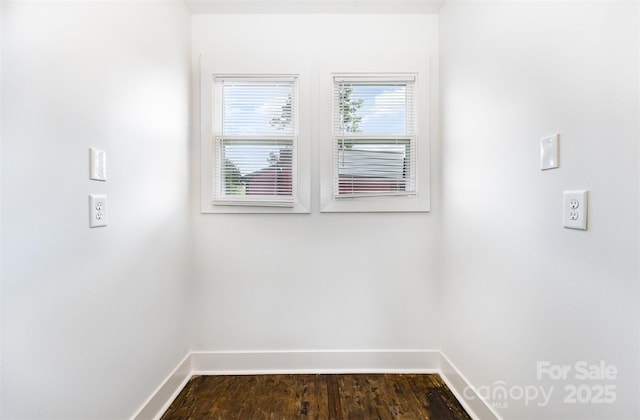 1112 Concord Ave, Monroe, NC 28110 - unfurnished room featuring baseboards and dark wood-type flooring
