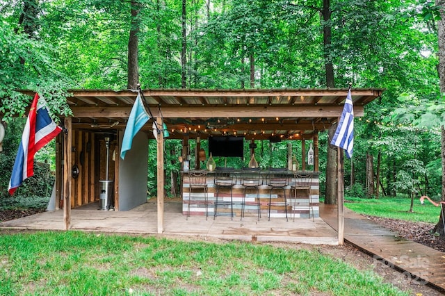 625 S Magnolia St, Mooresville, NC 28115 - view of property's community featuring a patio area and a bar