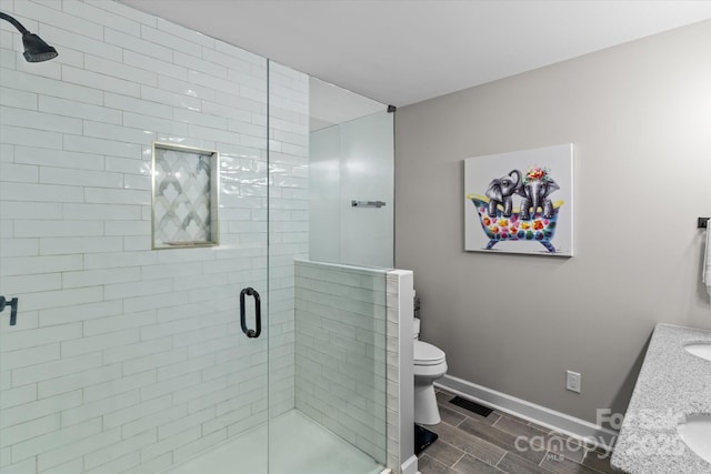 625 S Magnolia St, Mooresville, NC 28115 - full bath with a stall shower, toilet, baseboards, and vanity